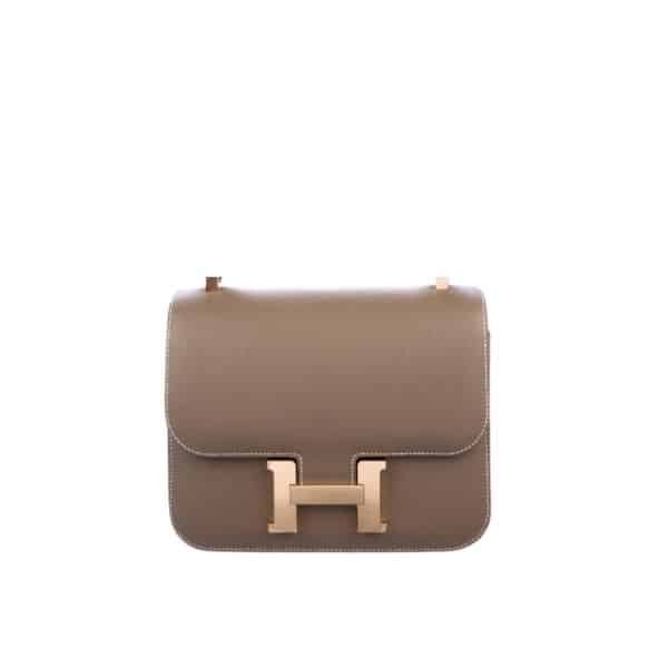 xr:d:DAFu9xTi5qs:604,j:7405448087944895649,t:23092904 Hermes Constance Leather Bag Dark Beige 18Cm - Image 1